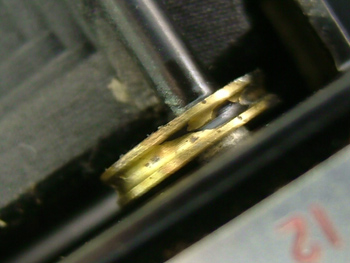 バック作動カム