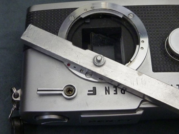 瓶の栓を抜くように